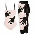 Women's patterned bikini swimsuit with a flowing white tulle skirt attached.