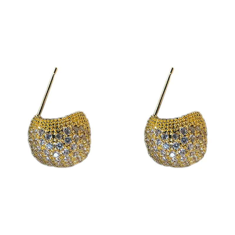 Gold and white geometric drop ear clip earrings with spherical bean design and full diamond flash