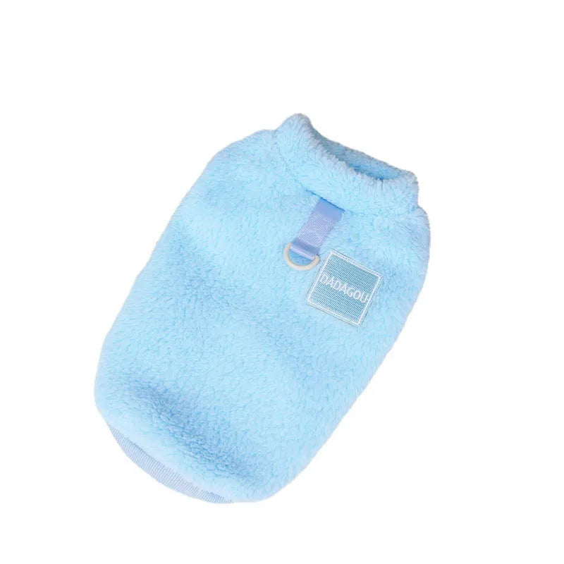 Blue coral fleece jacket on a small dog, showing soft texture and casual fit.
