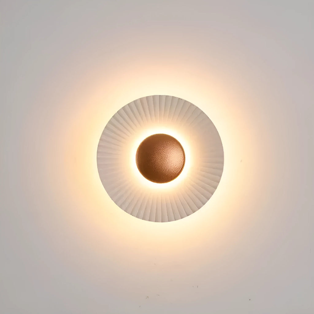 Round aluminium wall lamp with LED light in various colour options including white and gold variants