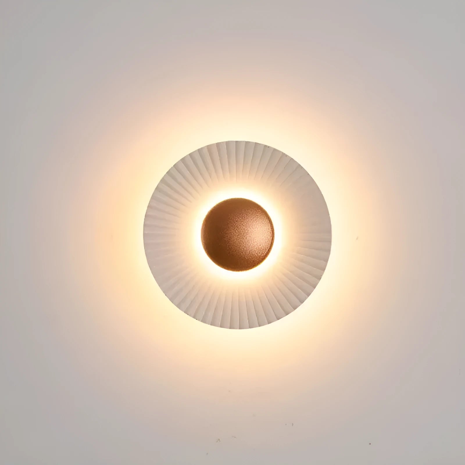 Round aluminium wall lamp with LED light in various colour options including white and gold variants
