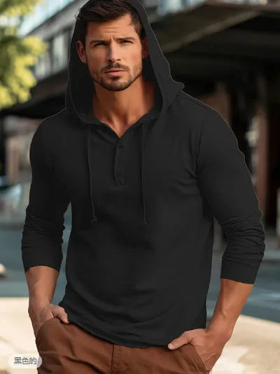 Man wearing a dark blue casual cotton hoodie pullover with long sleeves.
