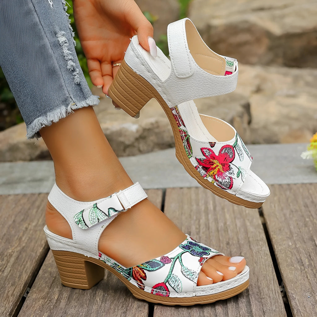 White women's high heel casual sandals with a visible Velcro strap buckle on the instep.