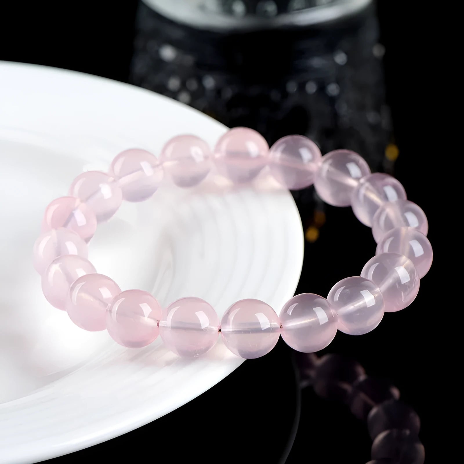 Natural starlight crystal round bead bracelet in pink with polished finish