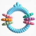 Blue TPR molar stick shaped dog chew toy for small breeds on a white background.