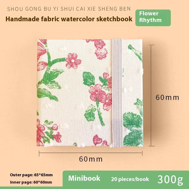 Feiluniao handmade fabric watercolour sketchbook with decorative cover, shown at 185mm length.