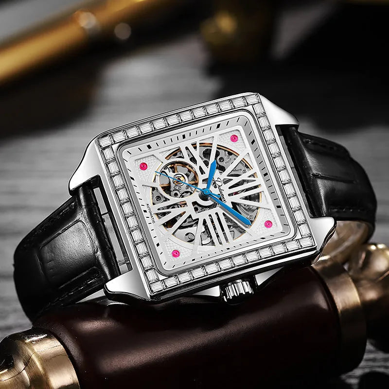Men's square automatic watch with diamond-studded bezel on a steel bracelet