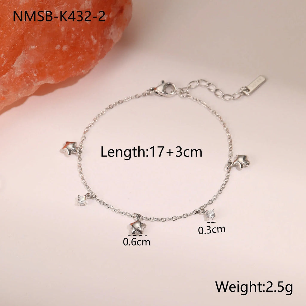 Gold or steel coloured women's bracelet with a hexagonal star zircon pendant on a stainless steel chain.