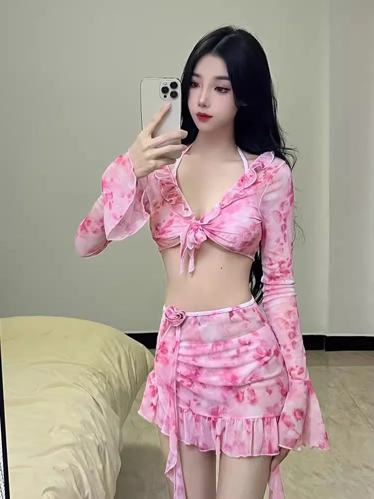 Women's cherry blossom pink floral bikini swimsuit on mannequin