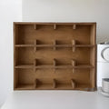 Solid wood square cup storage rack with multiple grid compartments in birch meridian colour