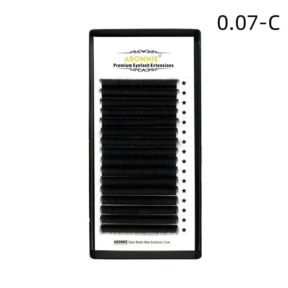 Pack of false eyelashes showing dense 16-row mink hair lashes on a clear band.