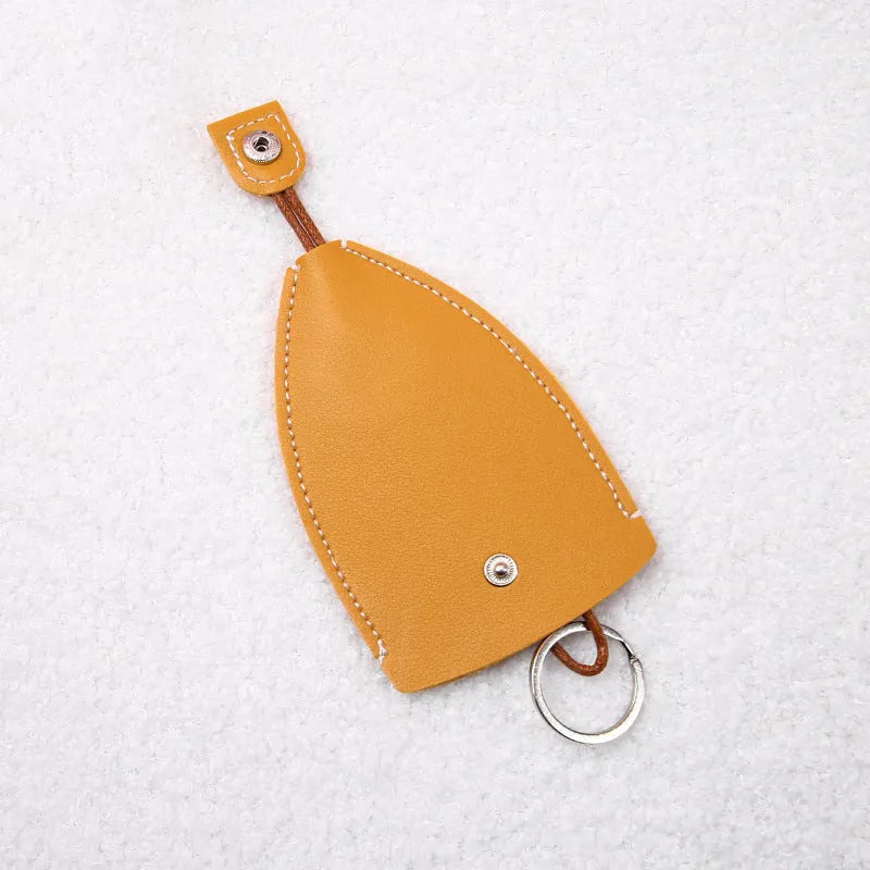 Colourful cartoon pull-out key case made from PU leather showing design options