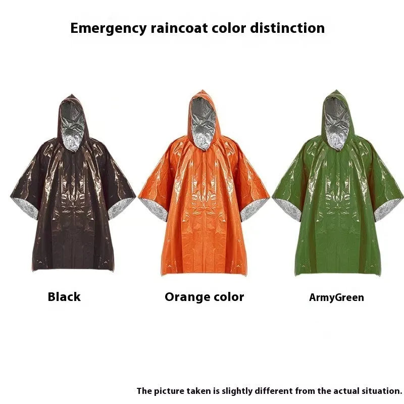 Adult in orange Marathon Wild cross-country rain poncho outdoors in rain.