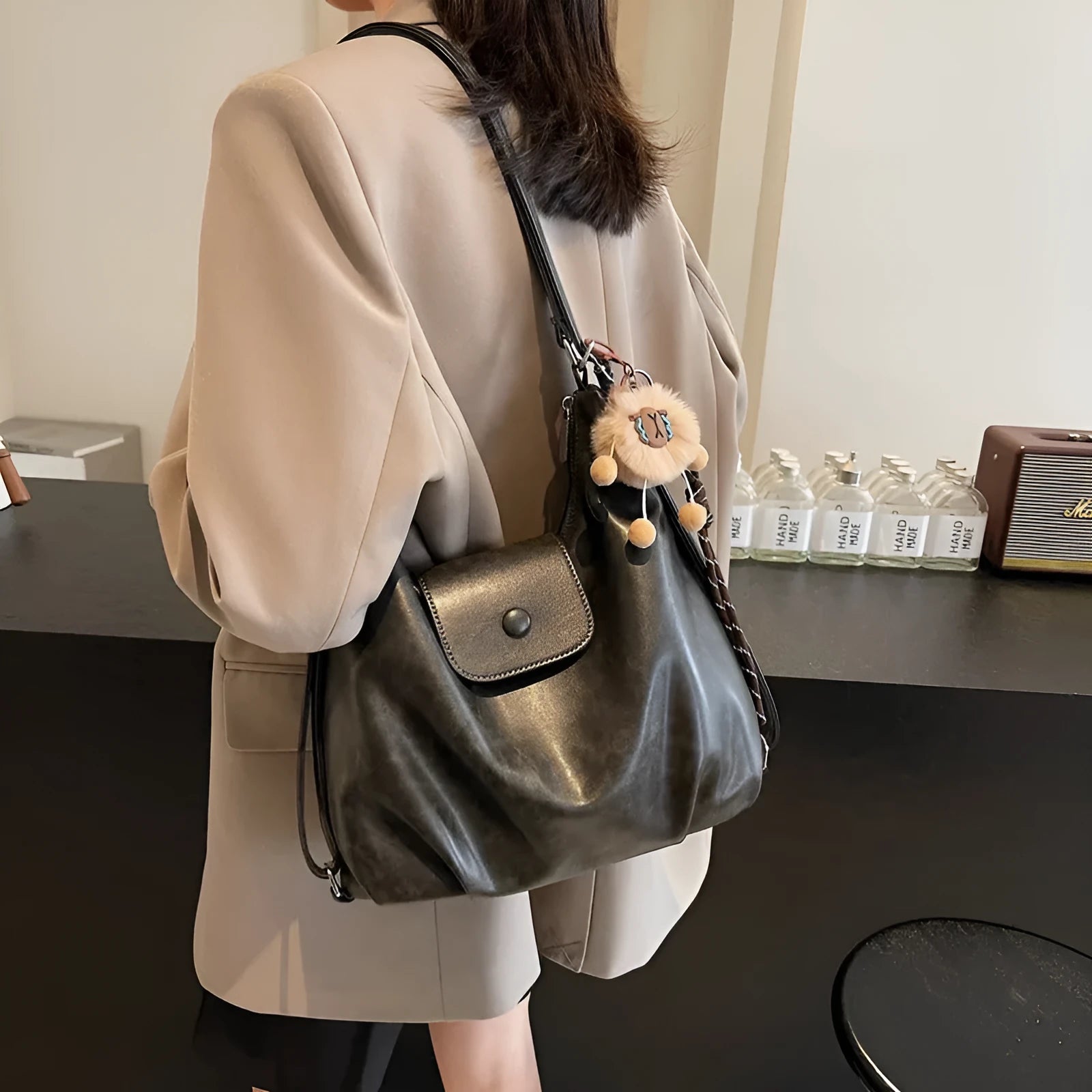 Large capacity PU leather commuter shoulder bag with mobile phone compartment in urban simplicity design