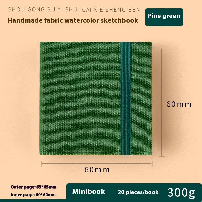 Feiluniao handmade fabric watercolour sketchbook with decorative cover, shown at 185mm length.