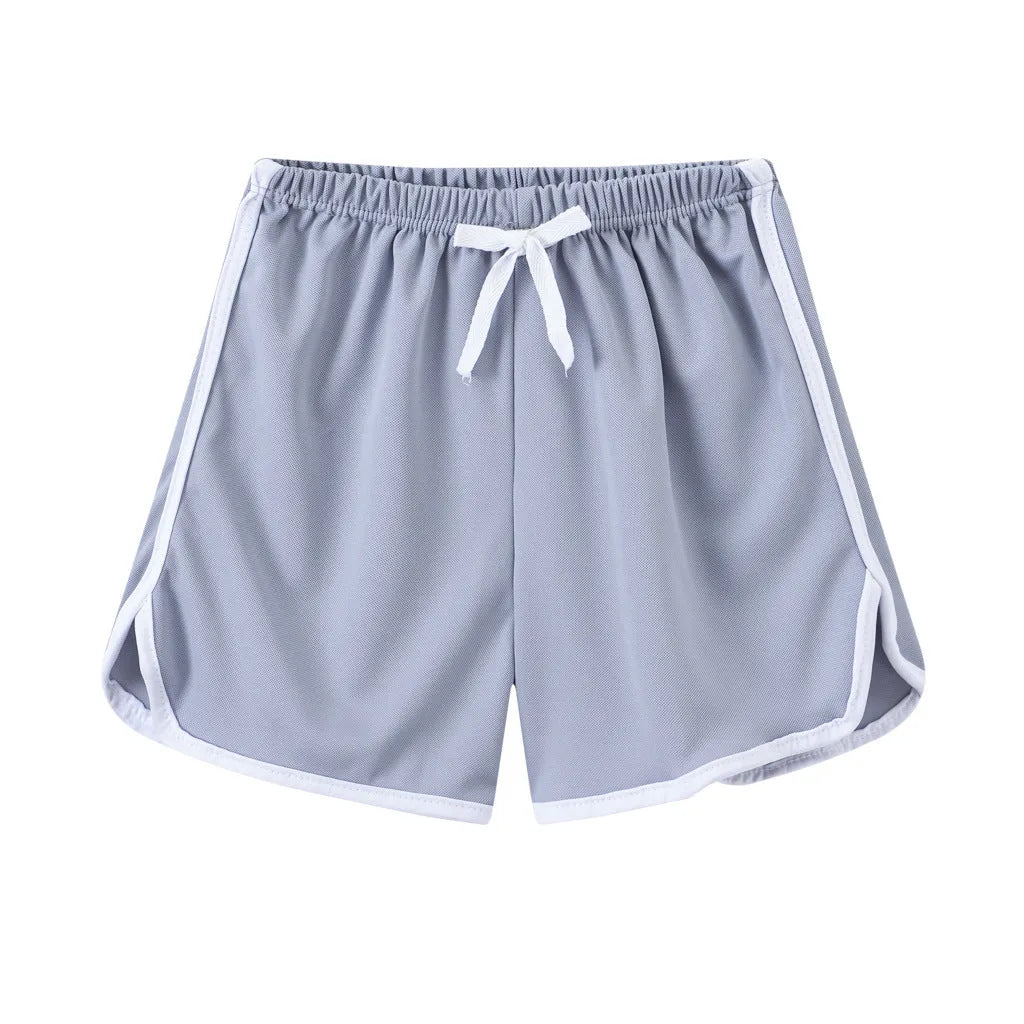 Children's polyester beach shorts in multiple prints and solid colours with size range 100-140cm