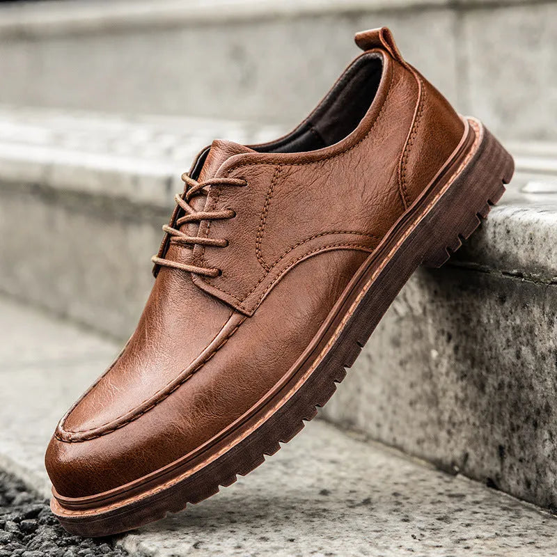 Men's black and brown leather casual shoes with round toe and flat rubber soles
