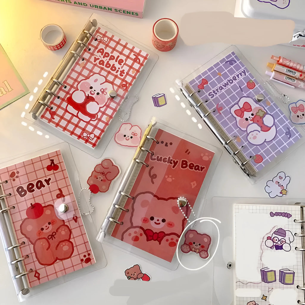 A6 student coil notebook with decorative cover showing 80 sheets of paper and six-hole binder compatibility
