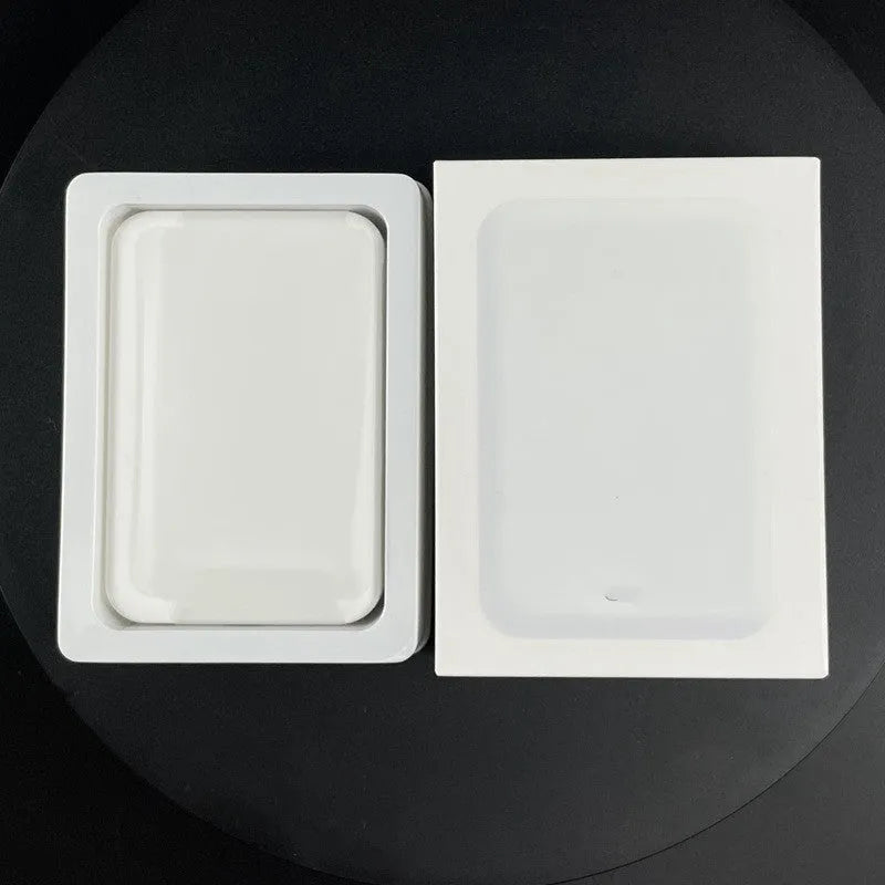 White magnetic wireless charger power bank with 5000mAh capacity showing compact PVC design