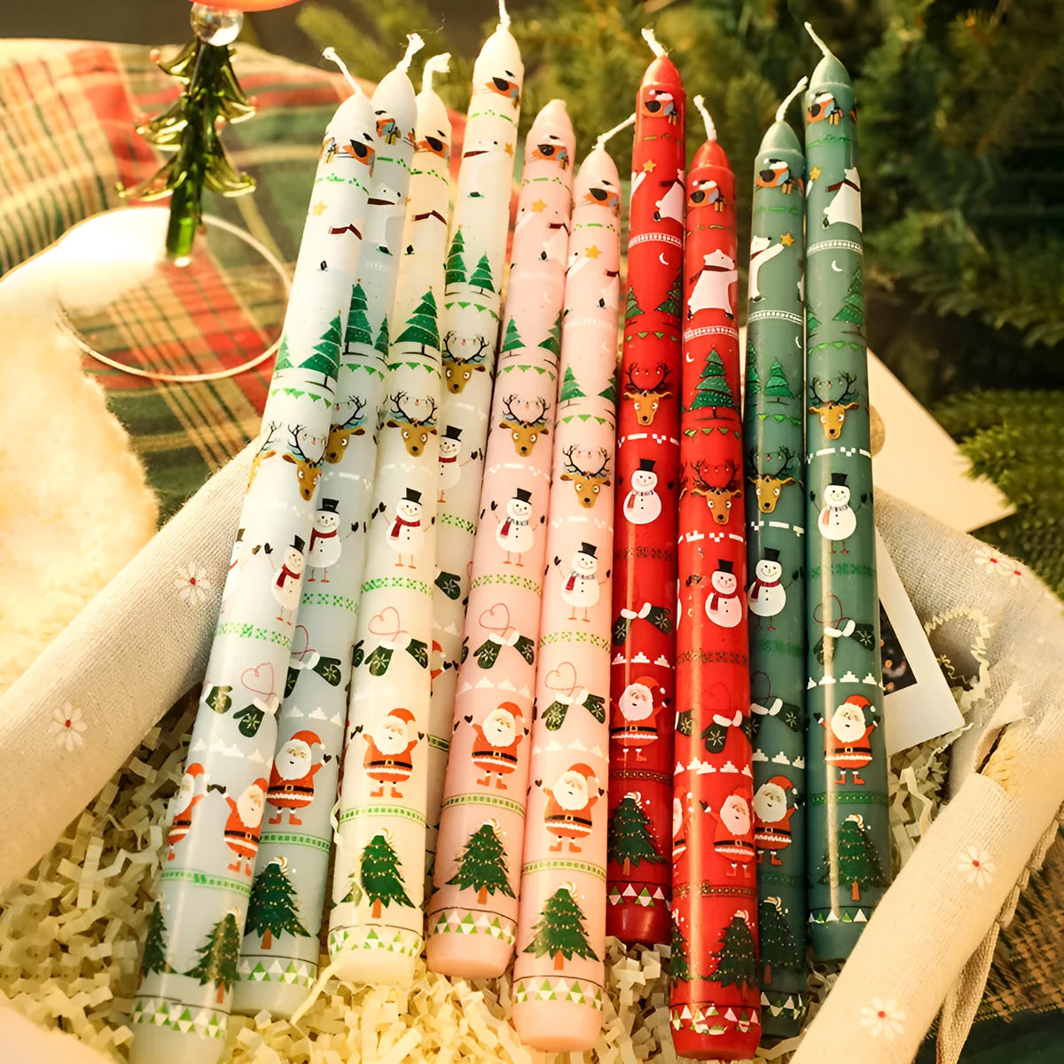 25cm Christmas pillar candle in paraffin, 2.2cm diameter, printed festive design, five colours available