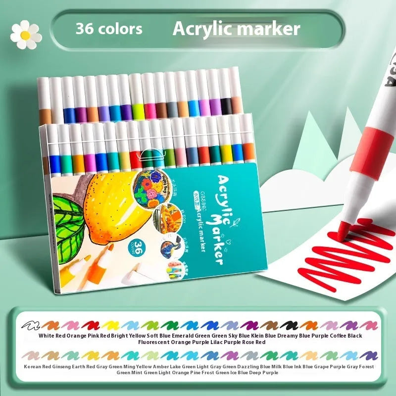 Box of multicoloured acrylic marker pens for student painting, showing plastic pen casings.
