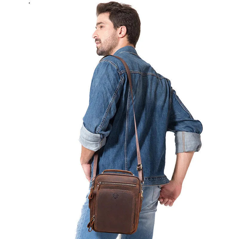 Men's brown Crazy Horse leather crossbody bag with single shoulder strap and sewing line detailing