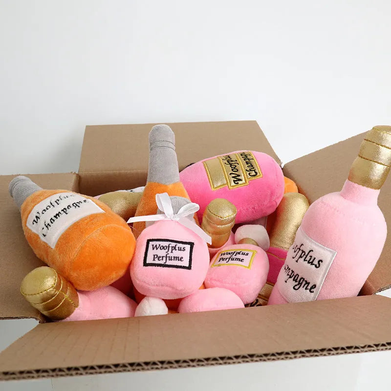 Plush wine bottle shaped pet toy for dogs and cats in assorted colours.
