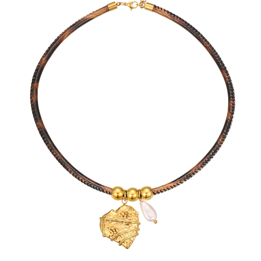 Geometric leopard pattern pendant necklace for women on an adjustable stainless steel chain with 18K gold plating.