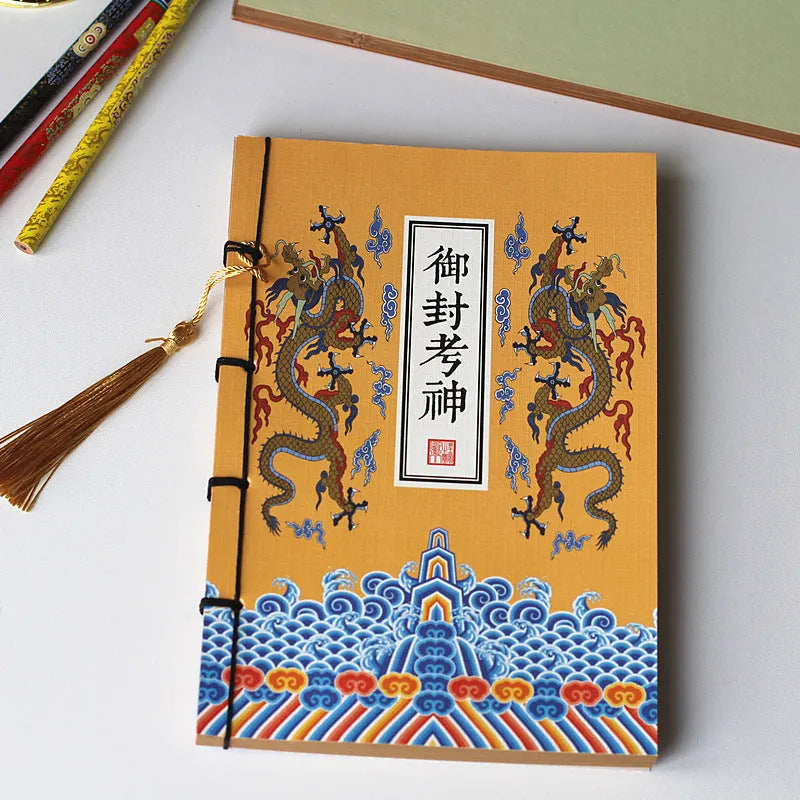 A5 antique wire-bound notebook with retro painting cover, thread binding, and black tassels.