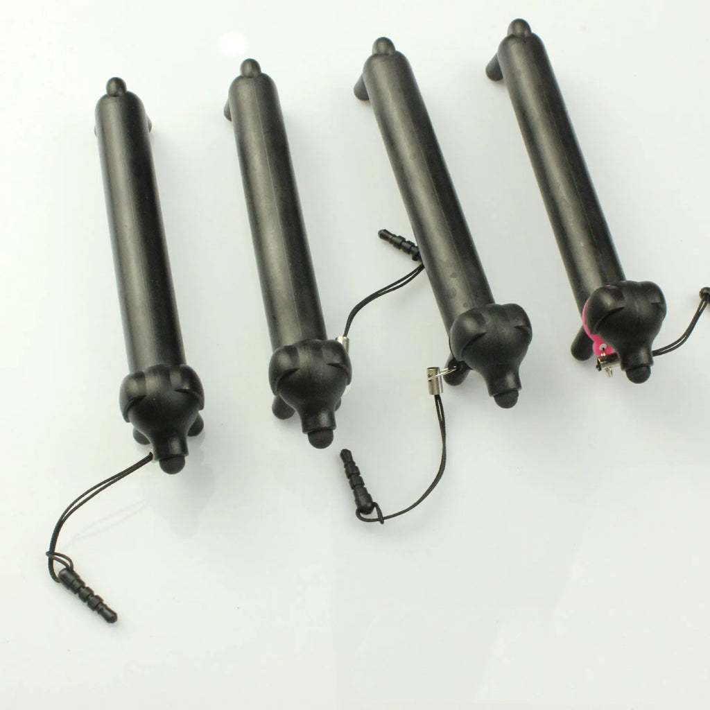 Black dog-shaped touch screen stylus showing split design for dual-length use and phone stand functionality