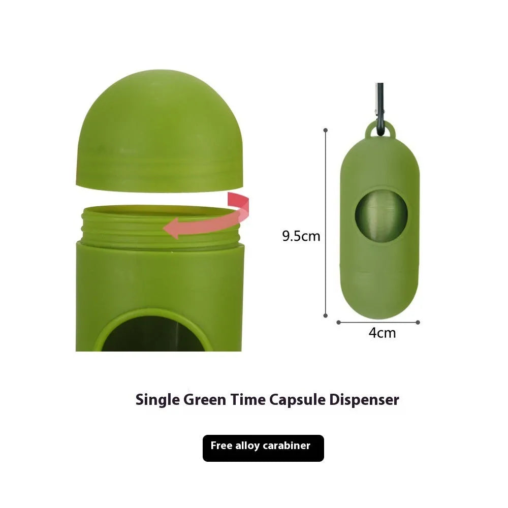 Roll of green EPI degradable pet garbage bags next to a boxed set with a dispenser.