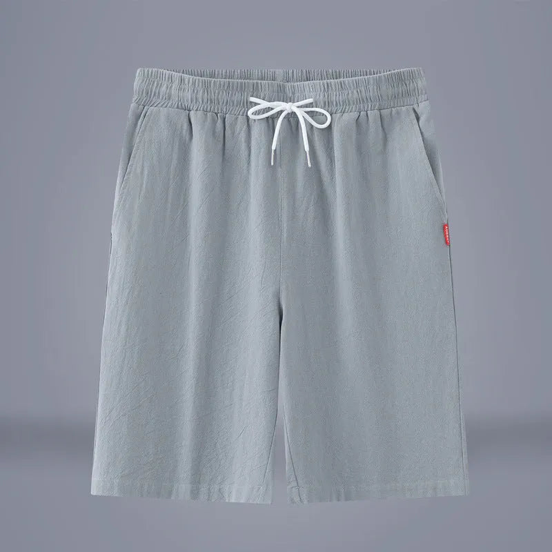 Casual cropped trousers in cotton-linen fabric with a drawstring waist, shown in a solid colour.