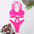 Women's solid colour strap bikini swimsuit on a white background.