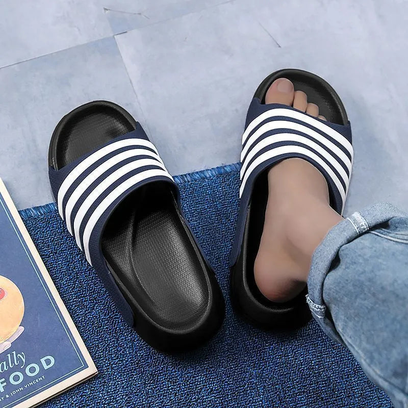 A pair of casual leisure sports style slippers with a PVC upper and EVA sole, shown in beige colour.
