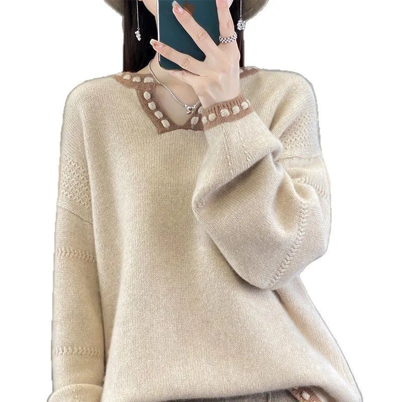 Women's camel coloured V-neck long sleeve viscose pullover sweater laid flat.