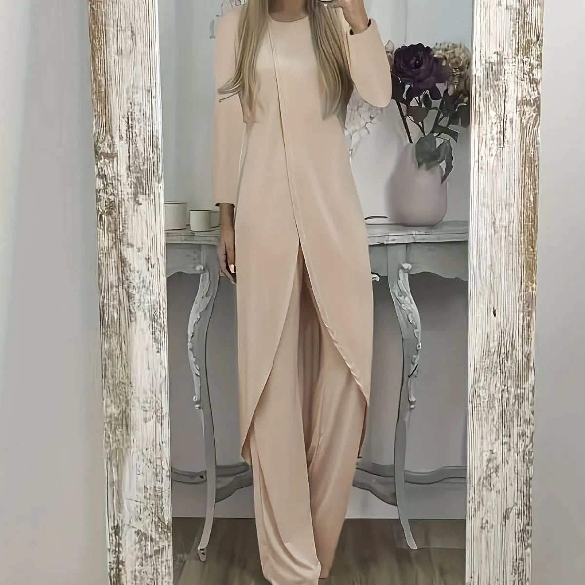 Casual long sleeve two-piece set with loose round neck top and matching trousers in polyester