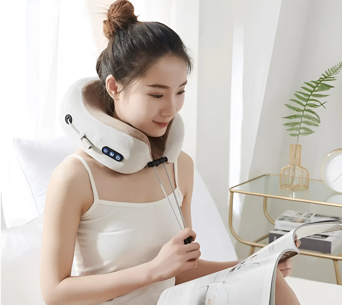 Brown U-shaped electric neck massager with controls for kneading and heat functions