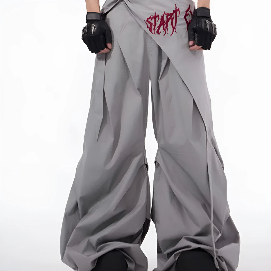 Boy modelling black wide-leg Korean-style casual trousers.