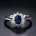 Copper women's ring with electroplated flower design and blue moissanite stone in three colour options