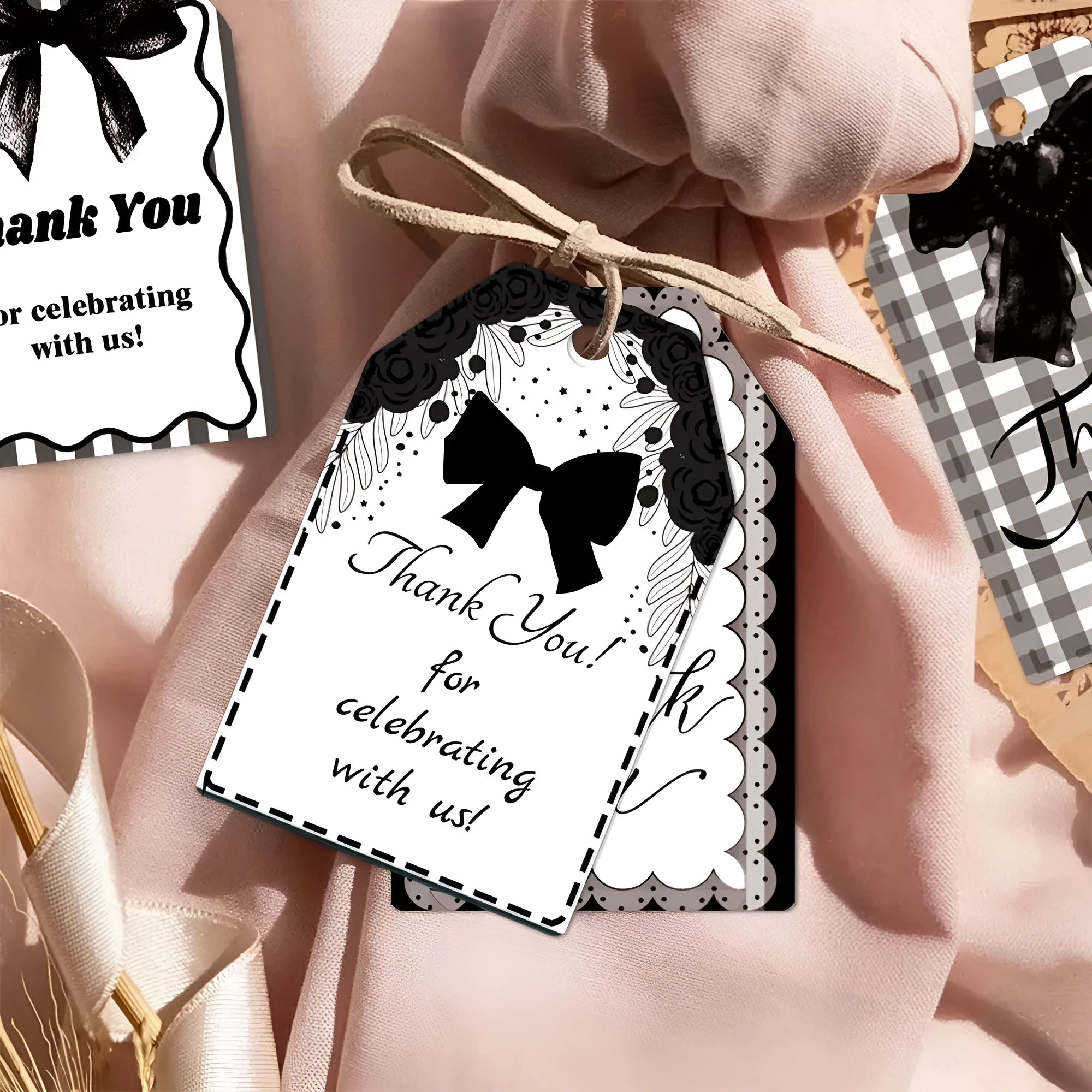 Set of 60 paper birthday gift tags with bowknot designs and natural hemp rope.