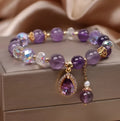 Purple amethyst crystal bracelet for women with micro inlay detail.