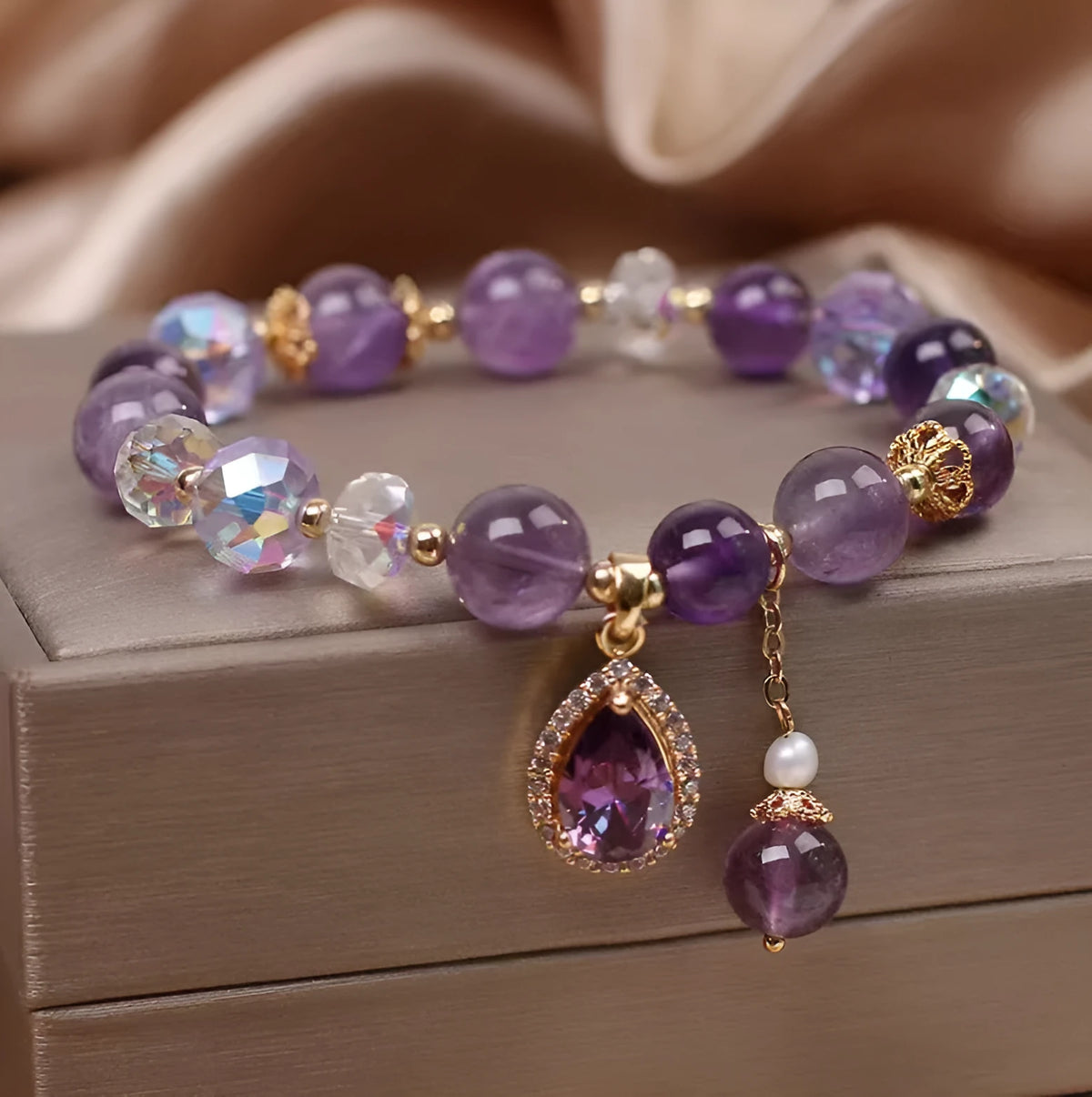 Purple amethyst crystal bracelet for women with micro inlay detail.