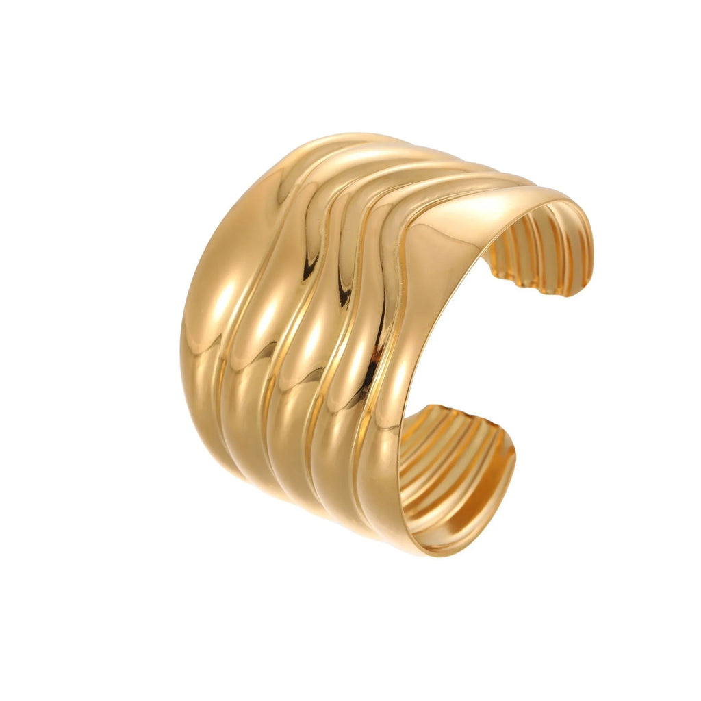 Women's stainless steel bracelet with geometric wave design and gold plating