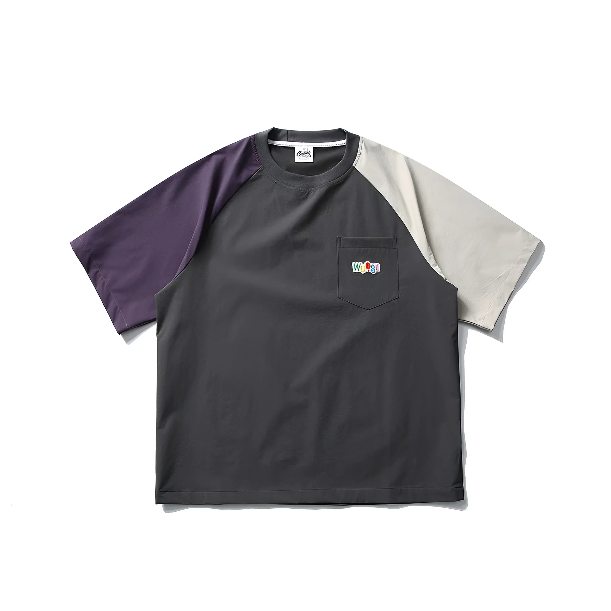 Dark grey loose fit T-shirt with contrast colour raglan sleeves on a hanger.