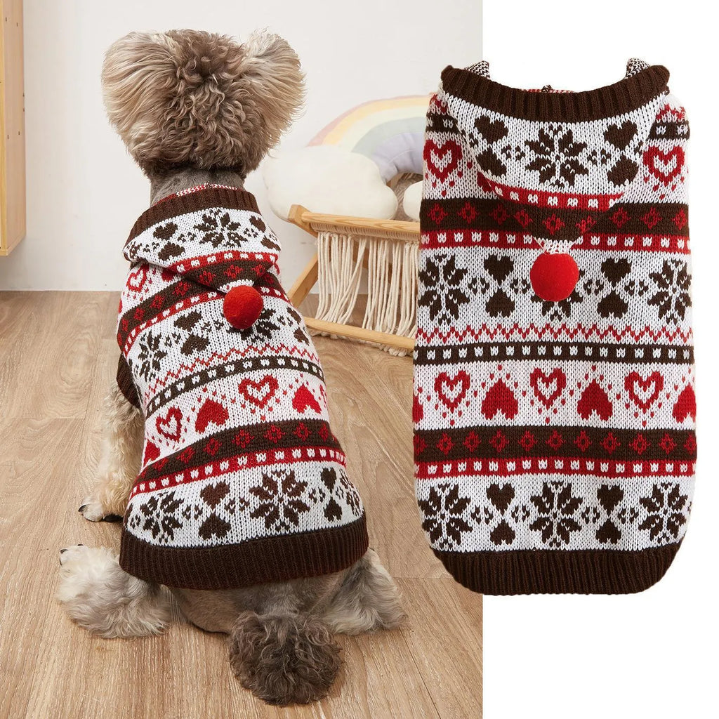 Pink striped camouflage knitted dog sweater with snowflake and heart pattern on a small white dog.