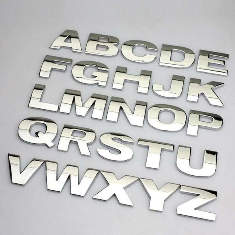 Zinc alloy 3D car bumper sticker showing raised metallic letter on black background