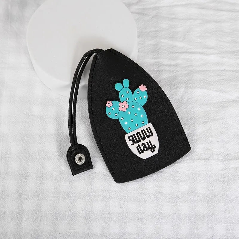 Colourful cartoon pull-out key case made from PU leather showing design options