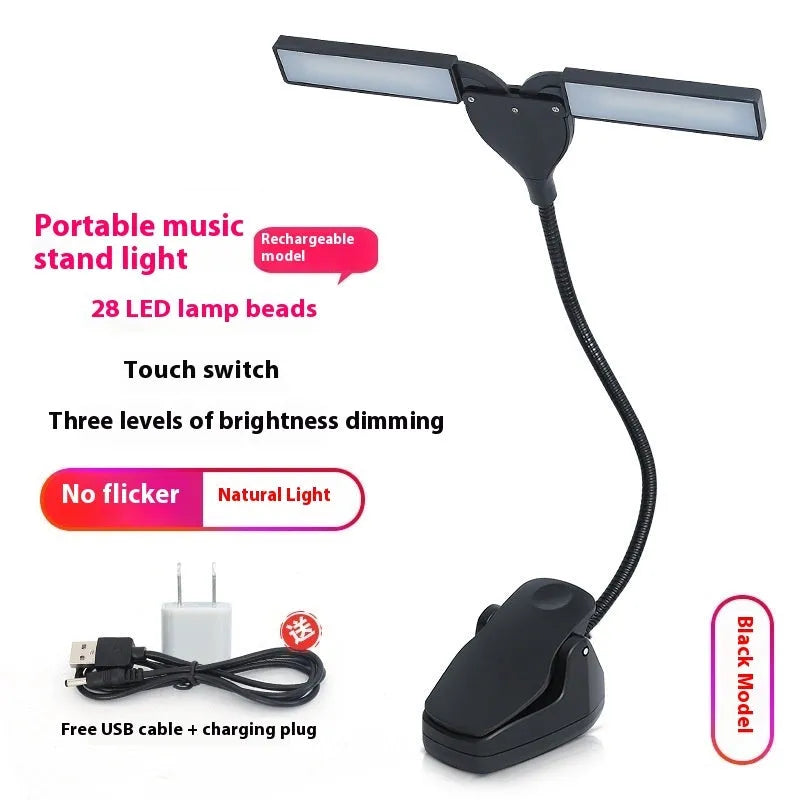 Black rechargeable music stand lamp with 28 LEDs on a music stand next to sheet music