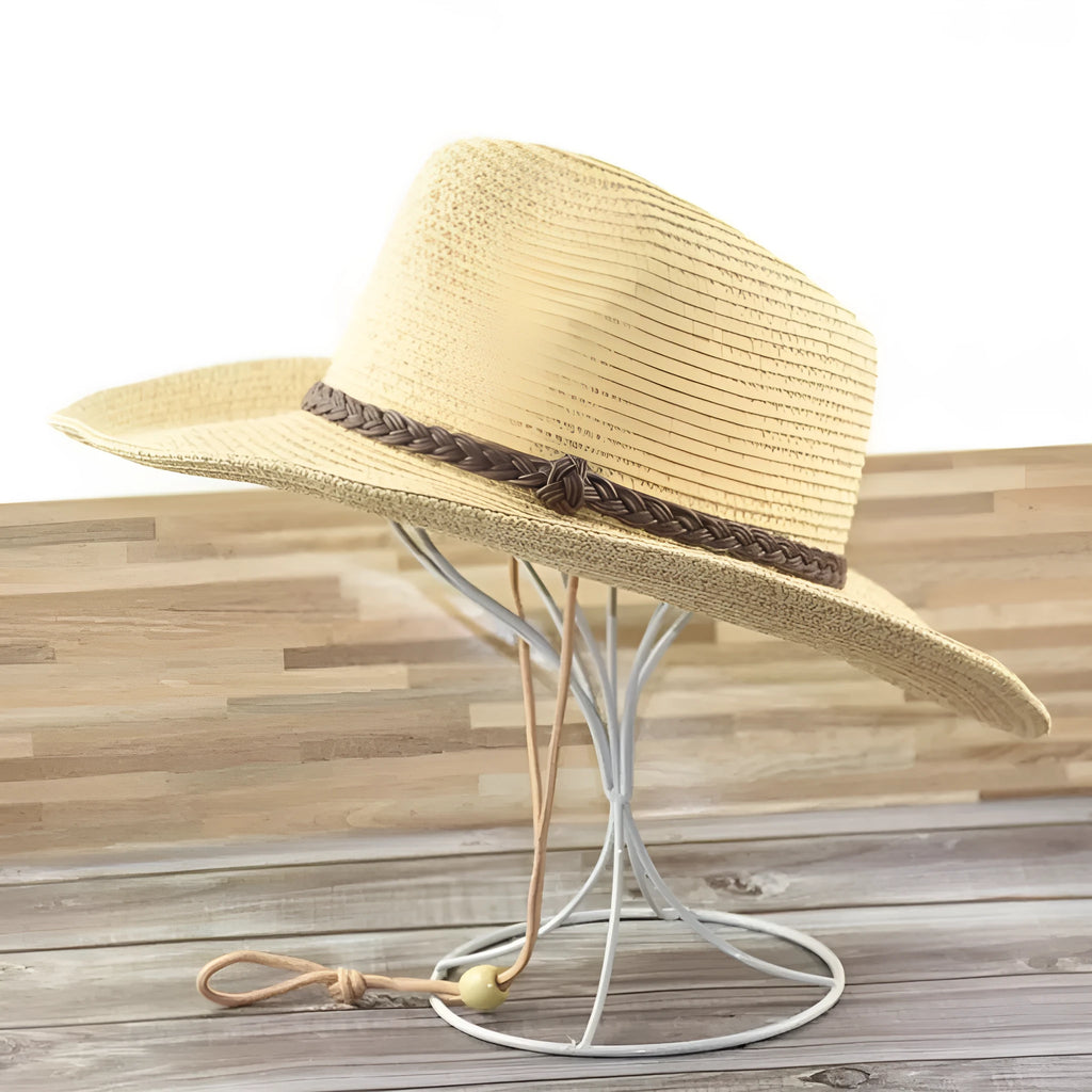 Men's foldable straw sun hat with wide brim in beige colour shown from side view