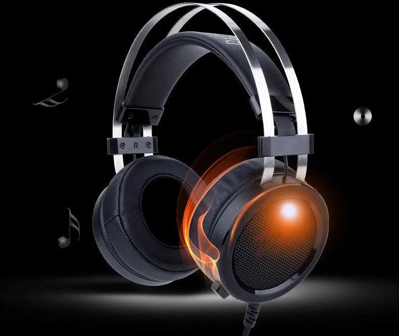 Black wired over-ear PC gaming headset with a 3.5mm plug and long cable.